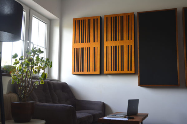 Slat acoustic treatment panels in office room